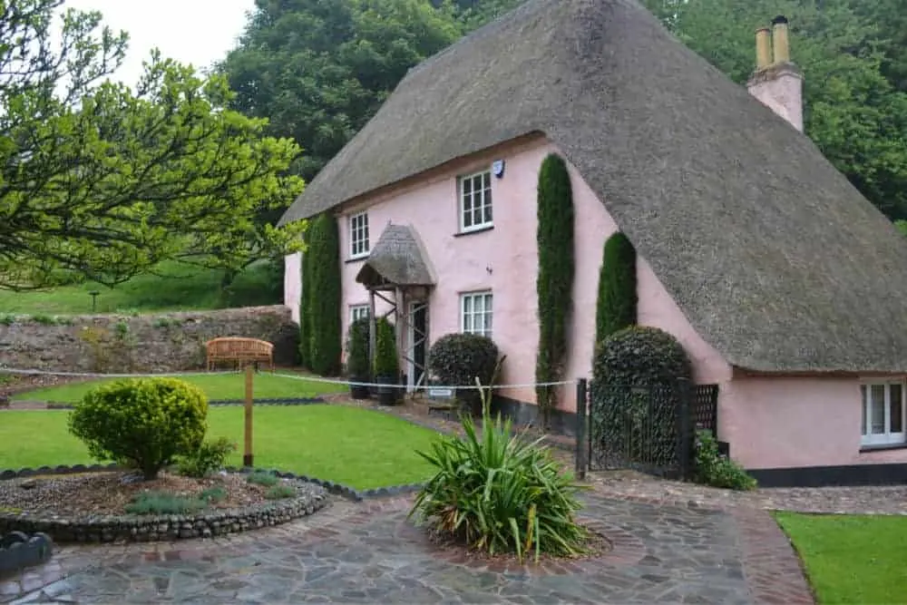 Rose Cottage with thatched roof in Cockington Village