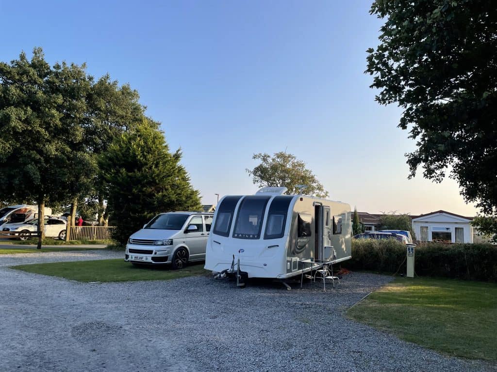 Caravan pitched at Dartmouth Camping and Caravanning Club site
