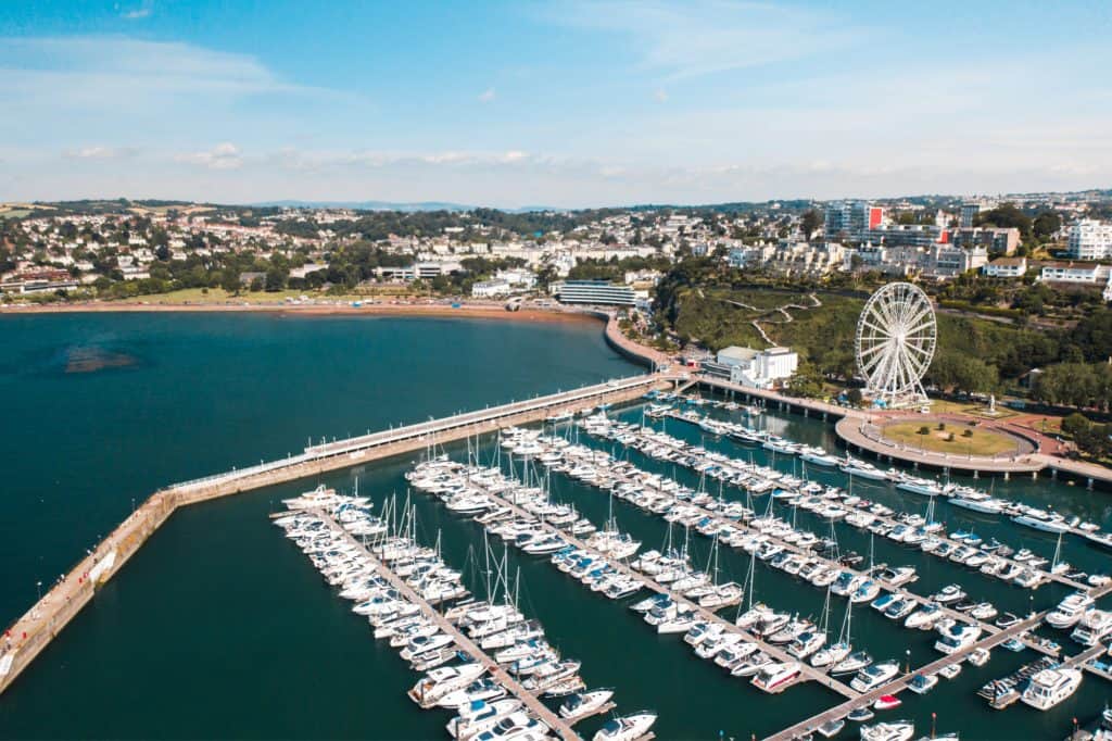 View of Torquay Harbour with boats and English Riviera Wheel