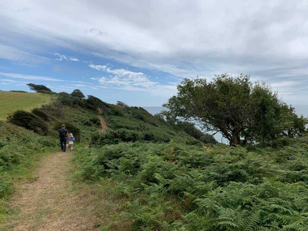 Family walking on footpath at Portlemouth Down