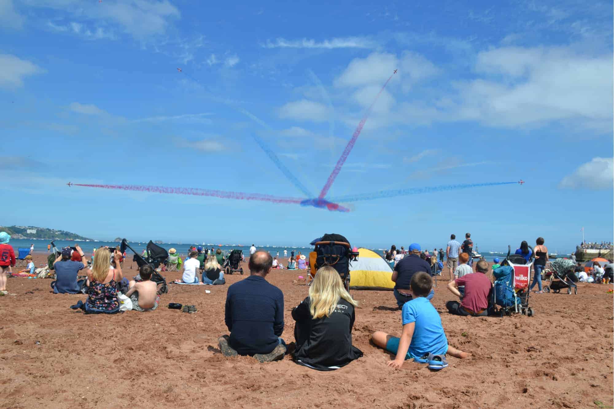Red Arrows performing in front of Paignton Sands in the English Riviera Airshow