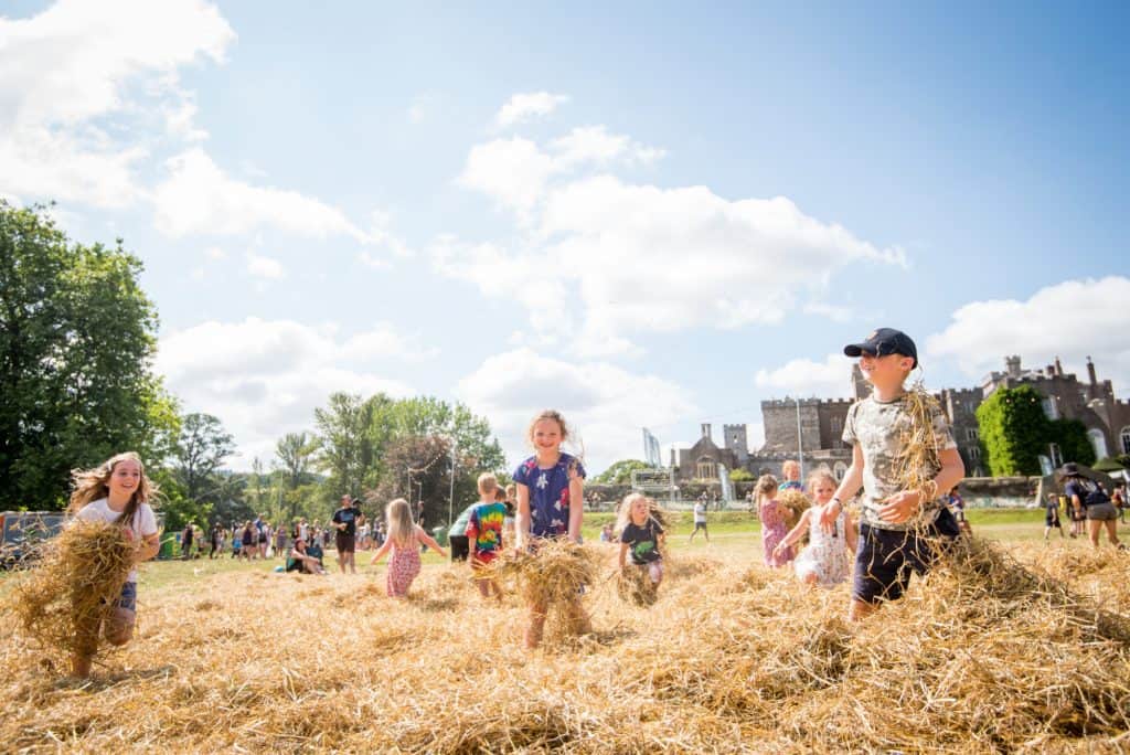 Children playing in lay outside Powderham Castle