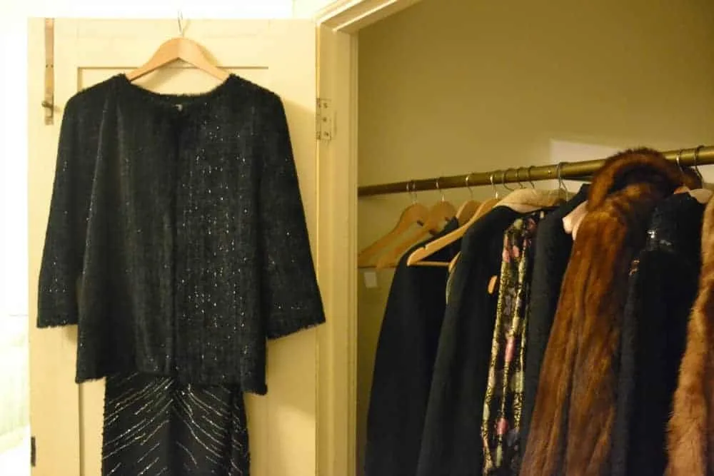1920s party clothes hanging in wardrobe