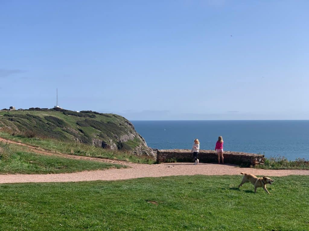 Children and dog at Berry Head Nature Reserve in South Devon - one of the places in Devon you can go in lockdown