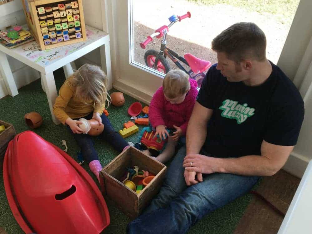 Children playing with toys and books in The Guardhouse Cafe