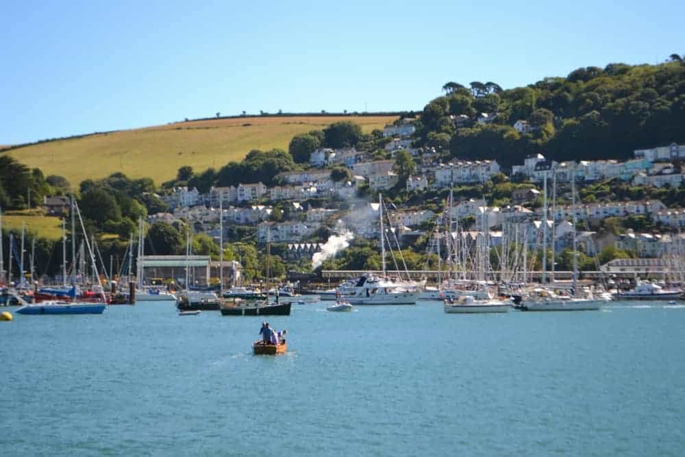 Dartmouth steam railway train seen from across the River Dart in Dartmouth