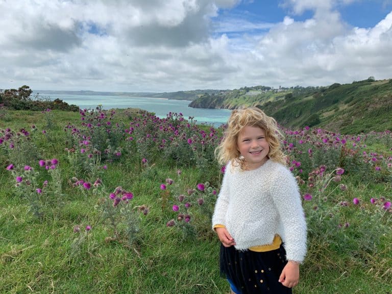 Child stood on Little Dartmouth footpath near Dartmouth in South Devon