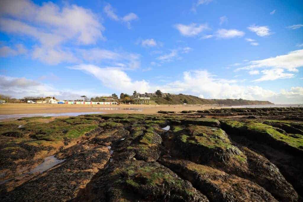 Rock pools on the sandy beach at Exmouth in East Devon