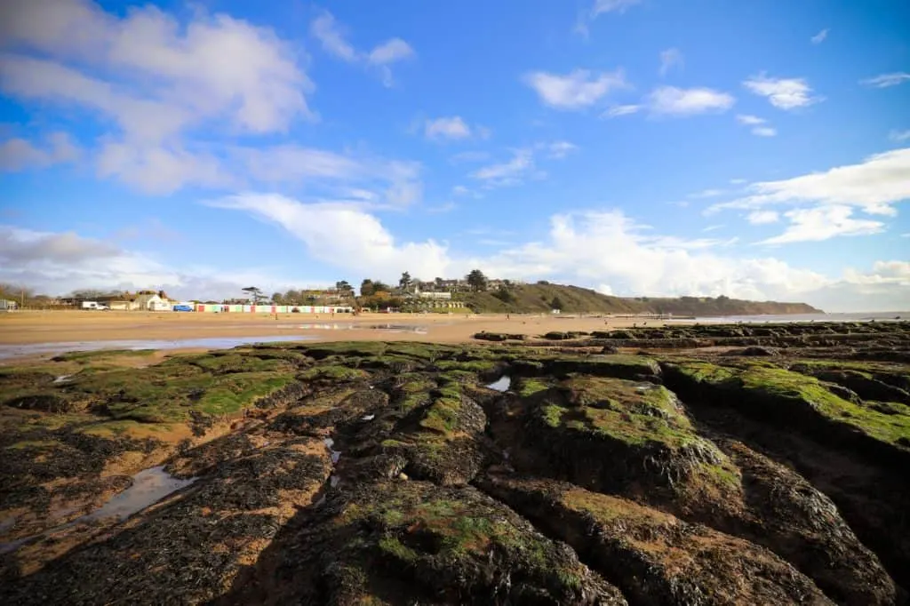 Rock pools on the sandy beach at Exmouth in East Devon