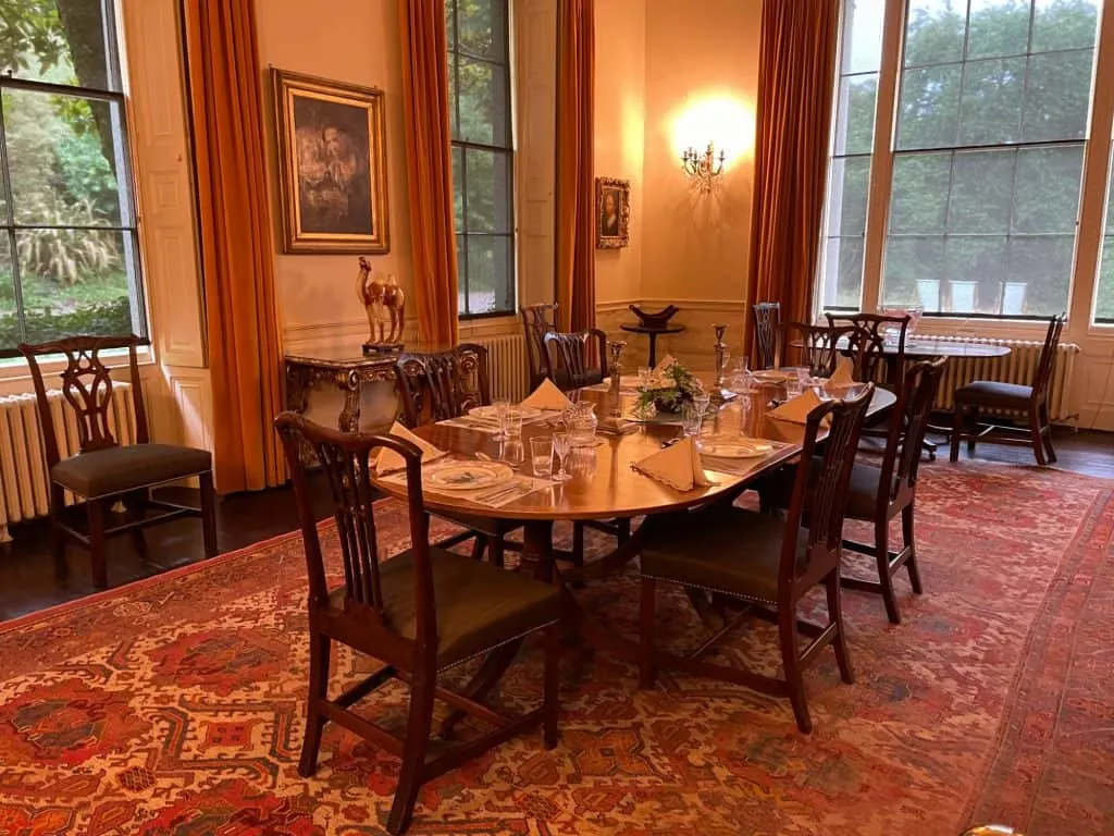 Dining table set in dining room of Greenway House