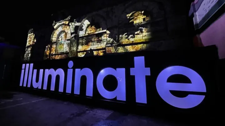 Huge Illuminate sign - lit up letters against a building in Ocean Studios