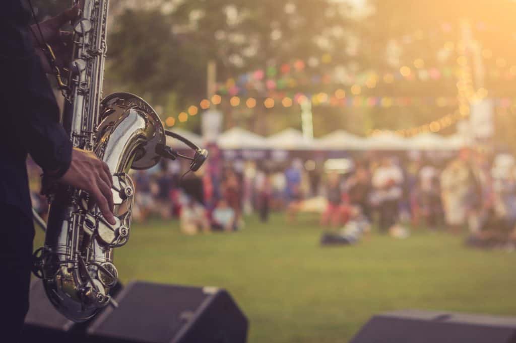 Saxophone being played at an outdoor concert