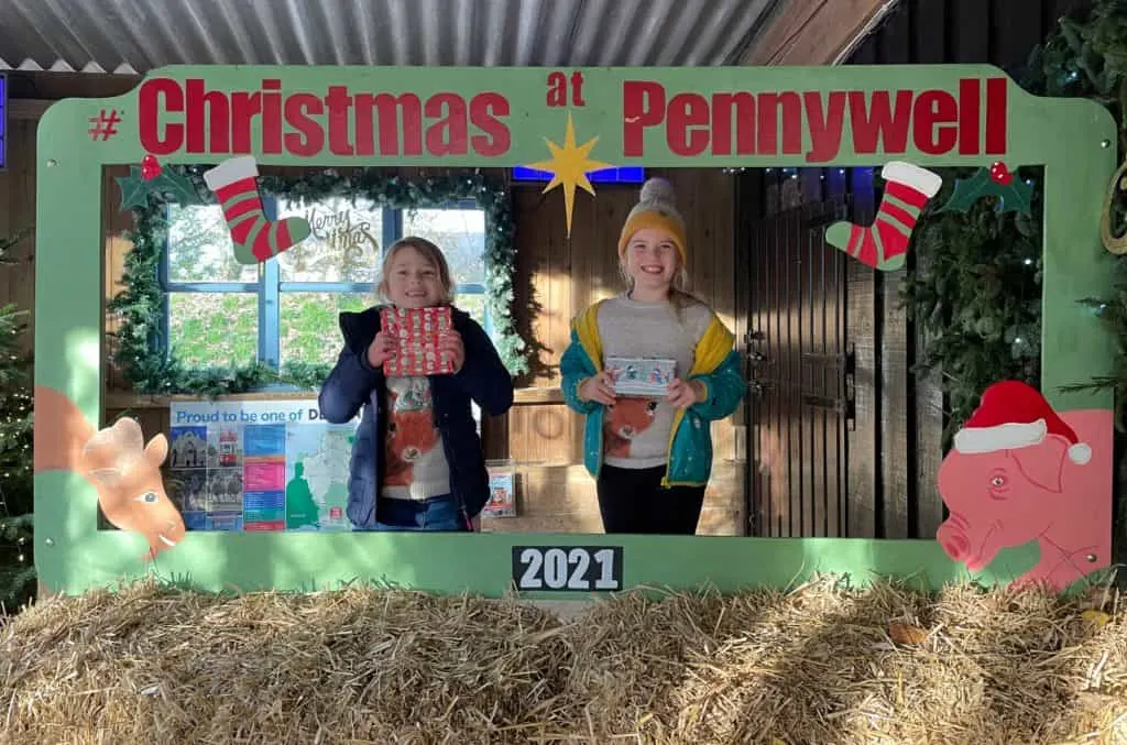 Children in selfie frame at the end of the Christmas at Pennywell Farm experience