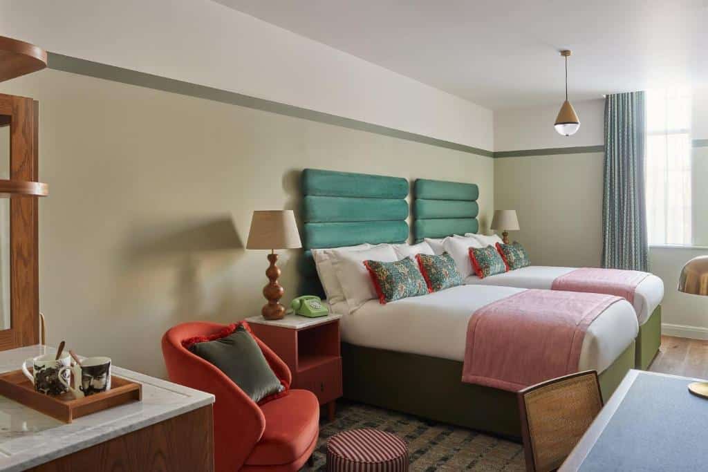 Room with two double beds at Hotel Indigo Exeter