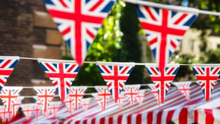 Union Jack flag triangular bunting hanging in a street, a festive decorations in UK