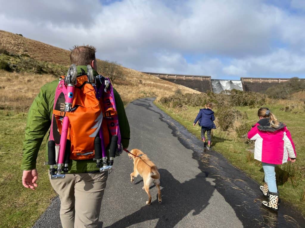 Family walking towards Avon Dam