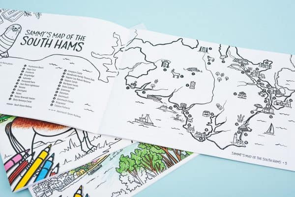 Pages of colouring book with map illustrating the South Hams area of South Devon