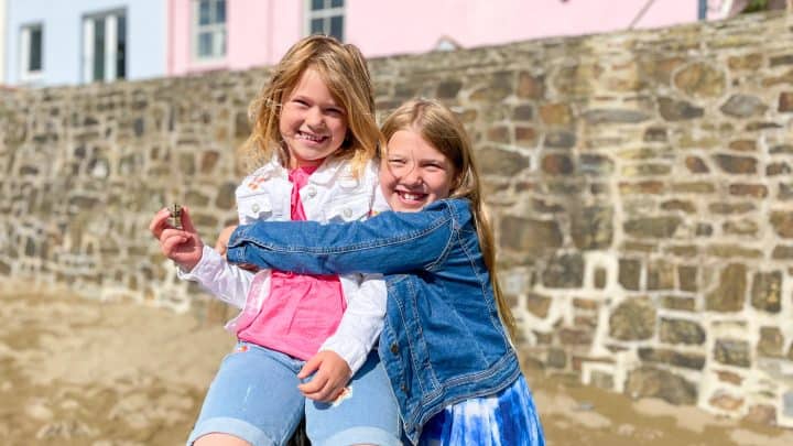 Children cuddling in Ilfracombe Harbour