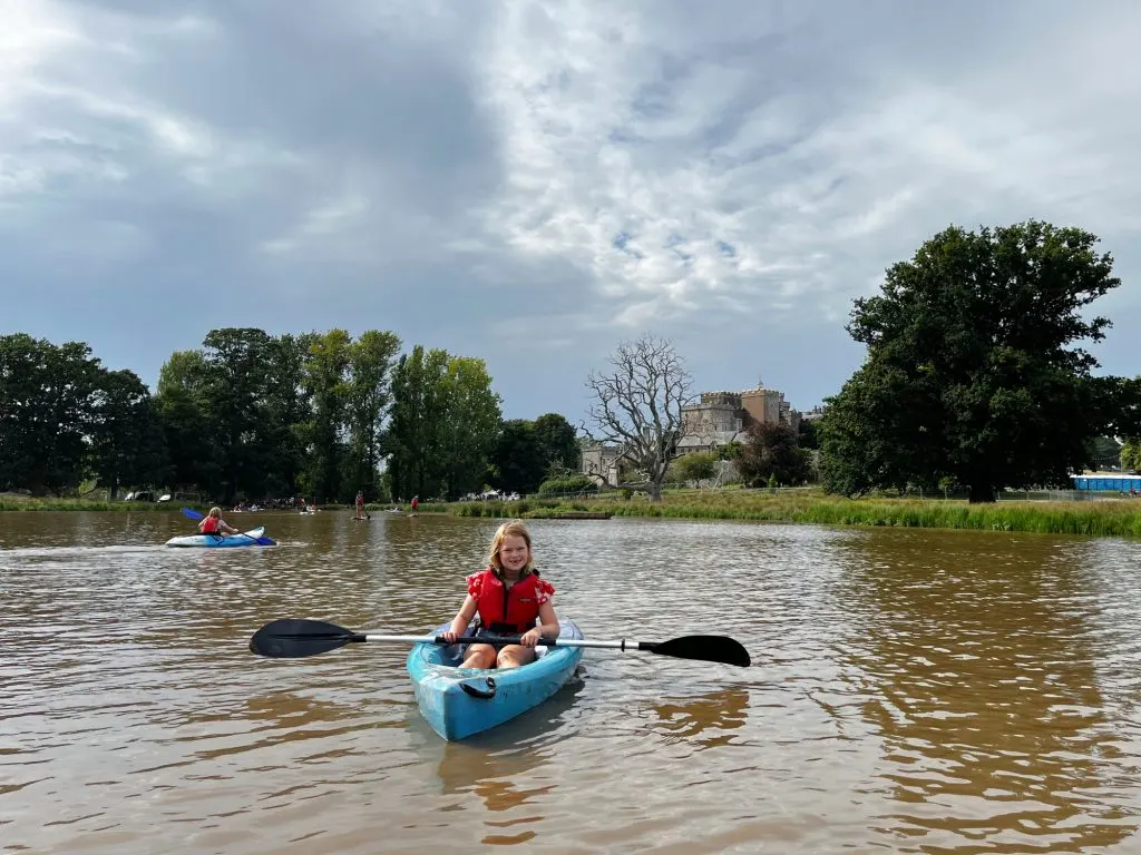 Child in kayak on Powderham Lake