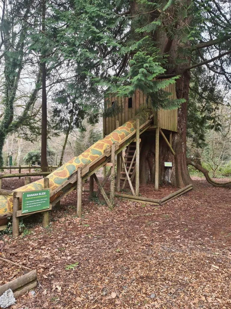 The banana slide from a tree house in an adventure playground