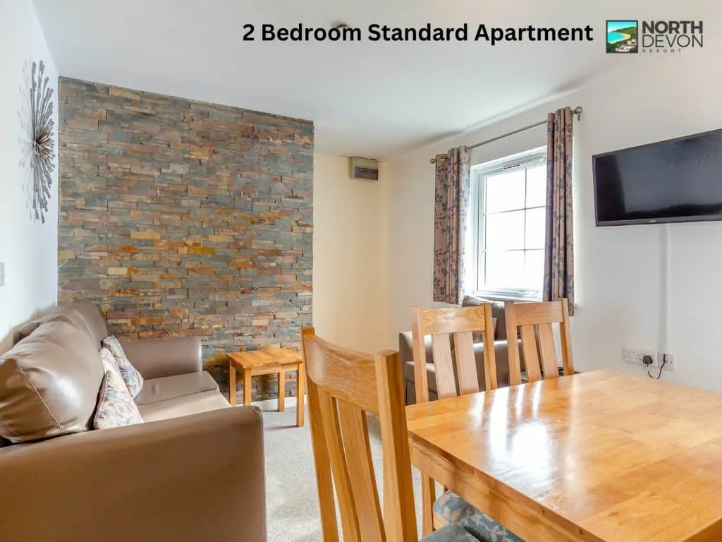 Dining and living room space in a 2 Bedroom Standard Apartment at North Devon Resort