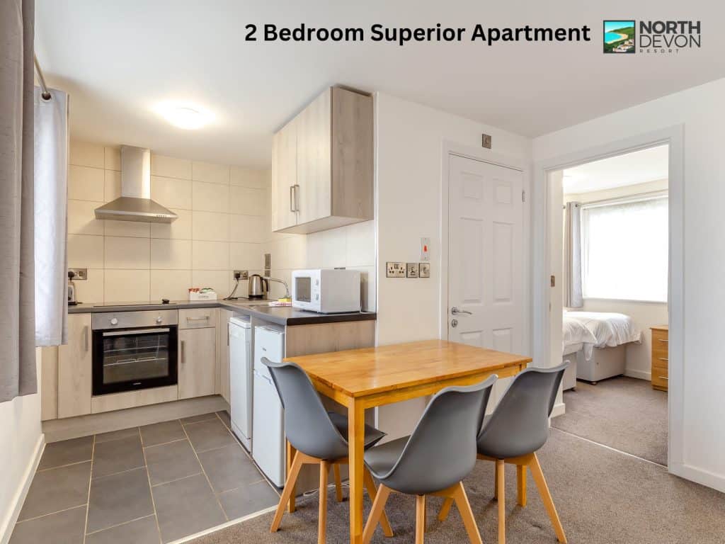 Kitchen and dining table in 2 Bedroom Superior Apartment