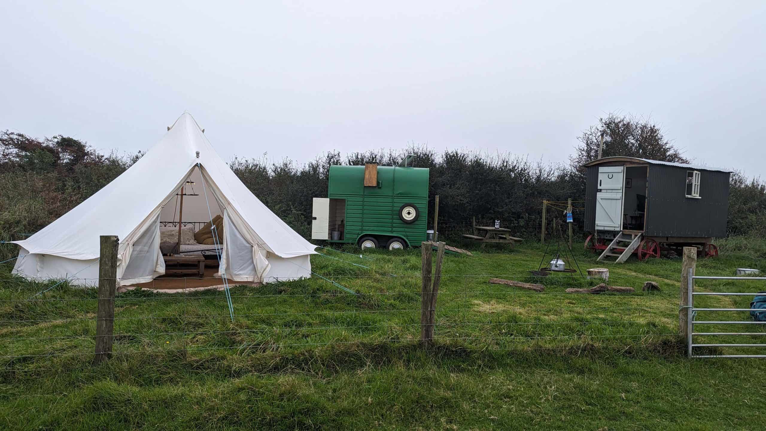 Camp Isobel with a bell tent, horse box and shepherds hut