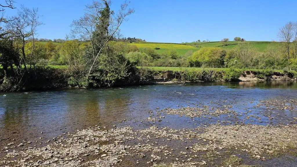 River running through the meadow at Valleyside Escapes