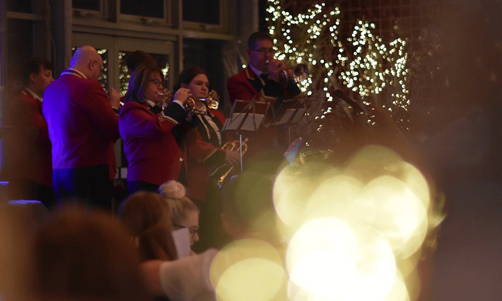 Carollers during a night time Christmas event