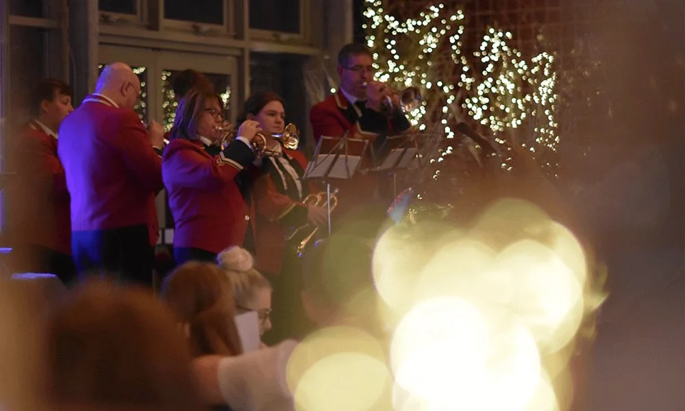 Carollers during a night time Christmas event
