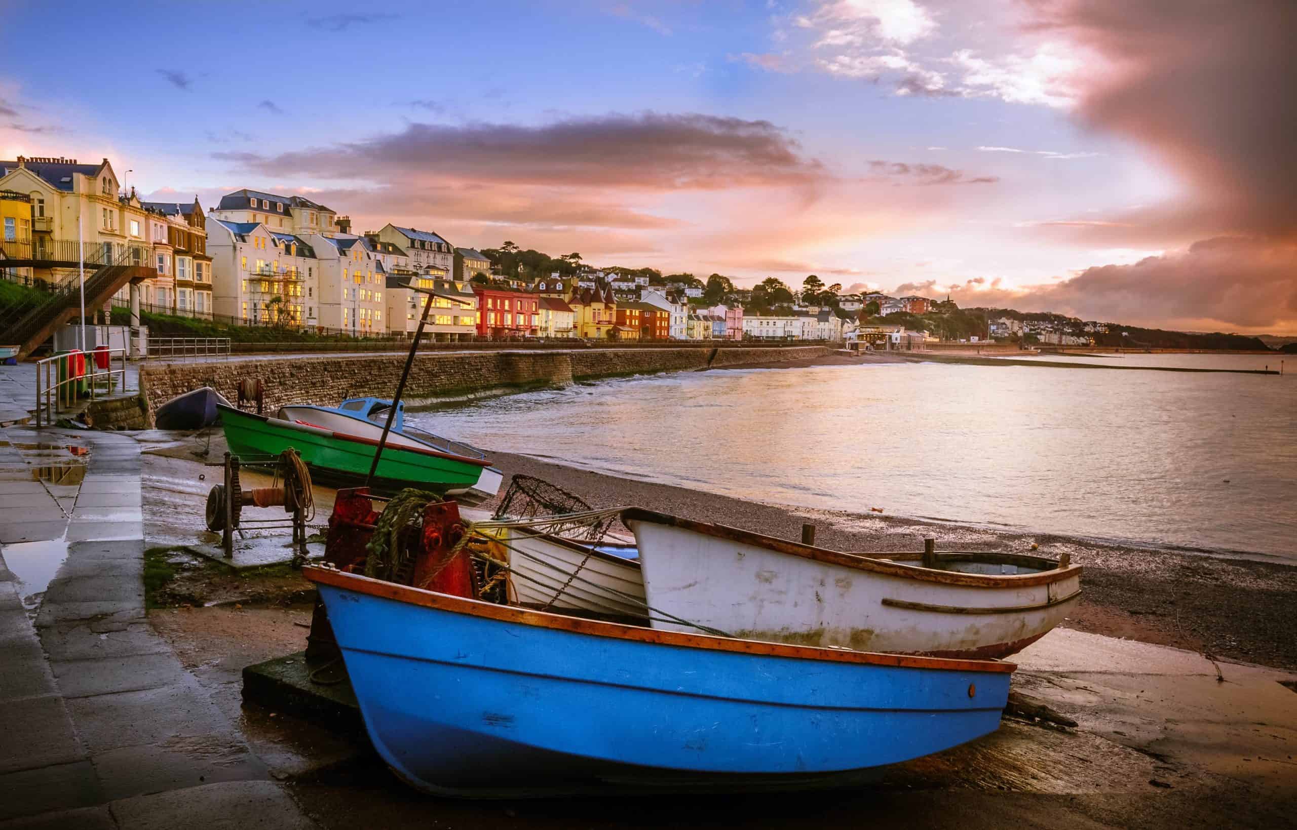 A view of Dawlish town across the beach at sunrise