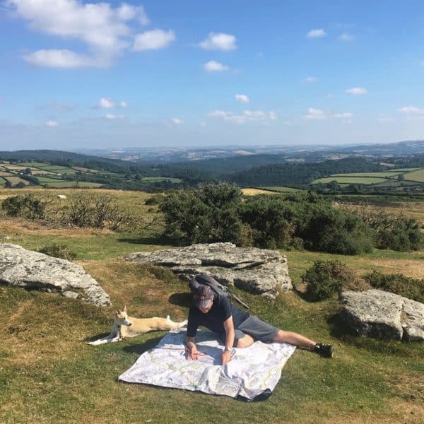 The OS Dartmoor PACMAT picnic blanket laid out on the floor on Dartmoor
