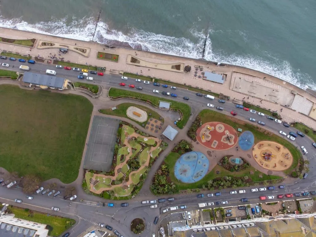 Aerial view of Teignmouth seafront showing play ground and mini golf course