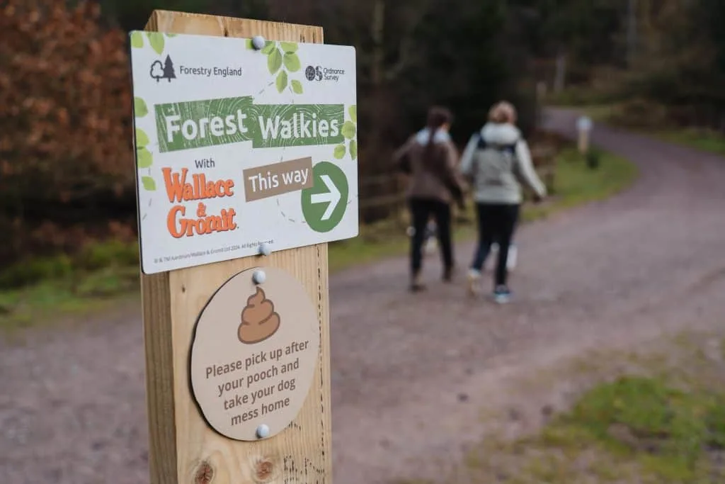 A Forest Walkies trail sign in the forest