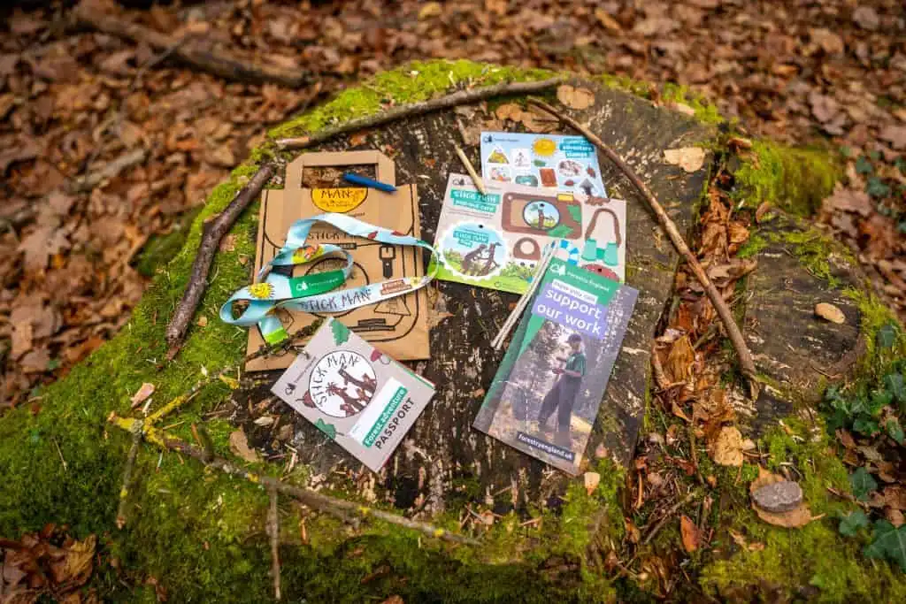 The contents of a Stick Man craft bag in the woods