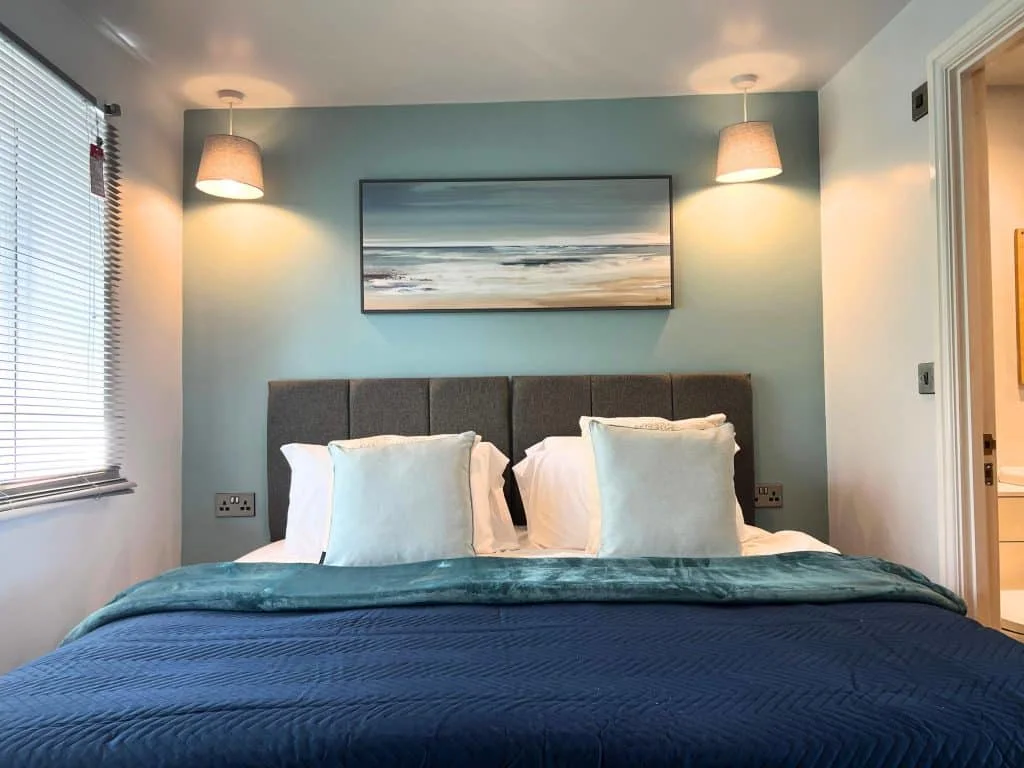 A sea-themed master bedroom in the three bedroom hot tub apartment at North Devon Resort