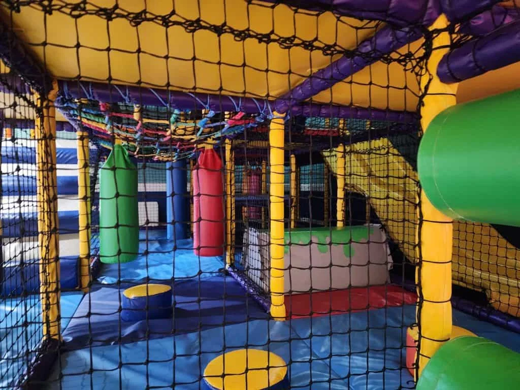 Looking through netting into soft play
