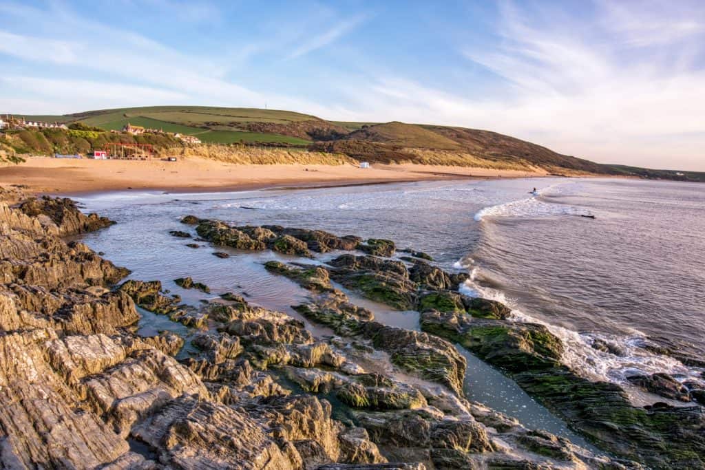 An evening view of rock polls at Woolacombe Beach