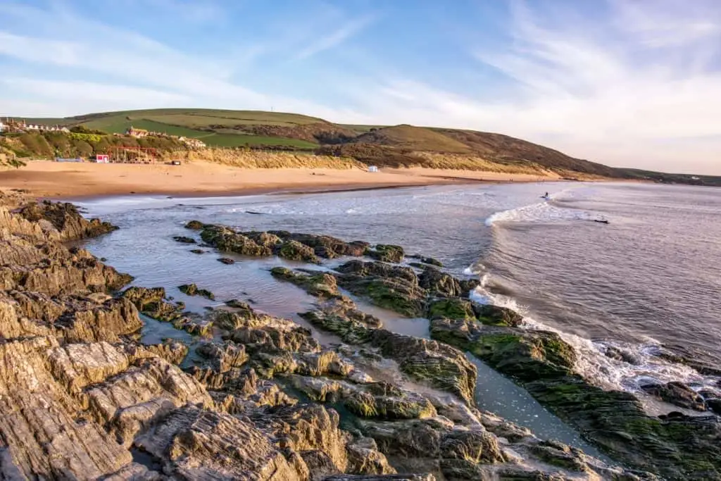 An evening view of rock polls at Woolacombe Beach