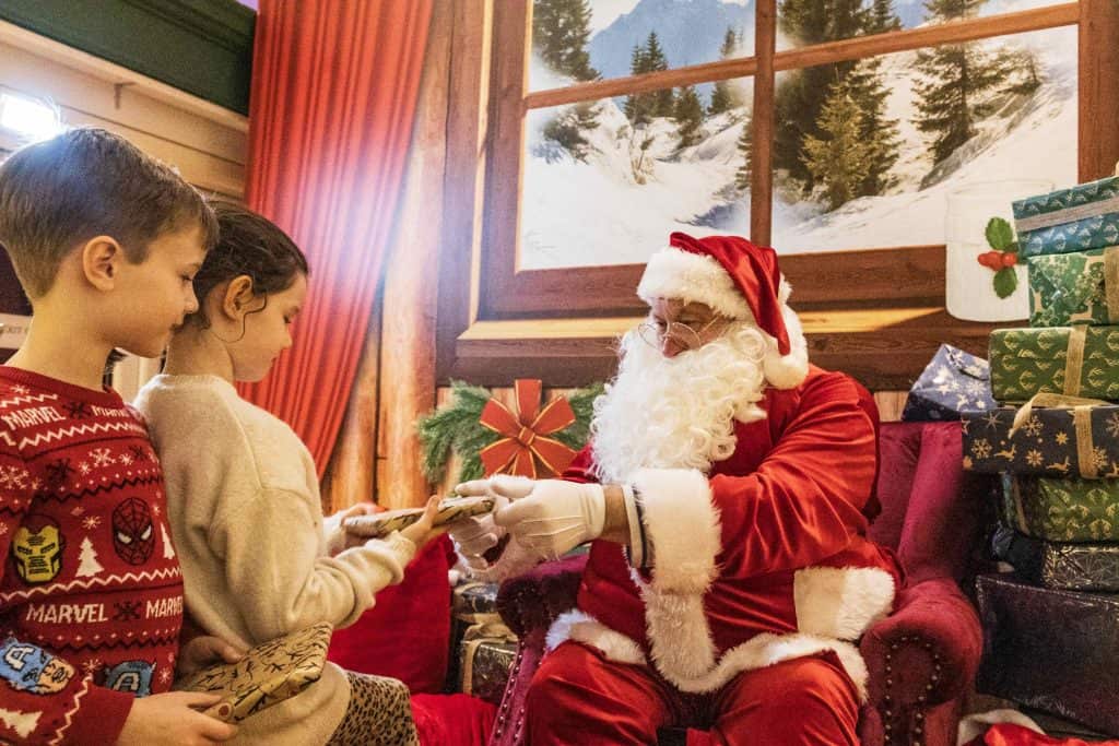 Children meeting Father Christmas in his grotto at The Mole Resort