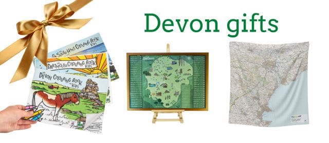A collage of the gifts available in the Devon with Kids shop including colouring books, scratch maps and picnic blankets