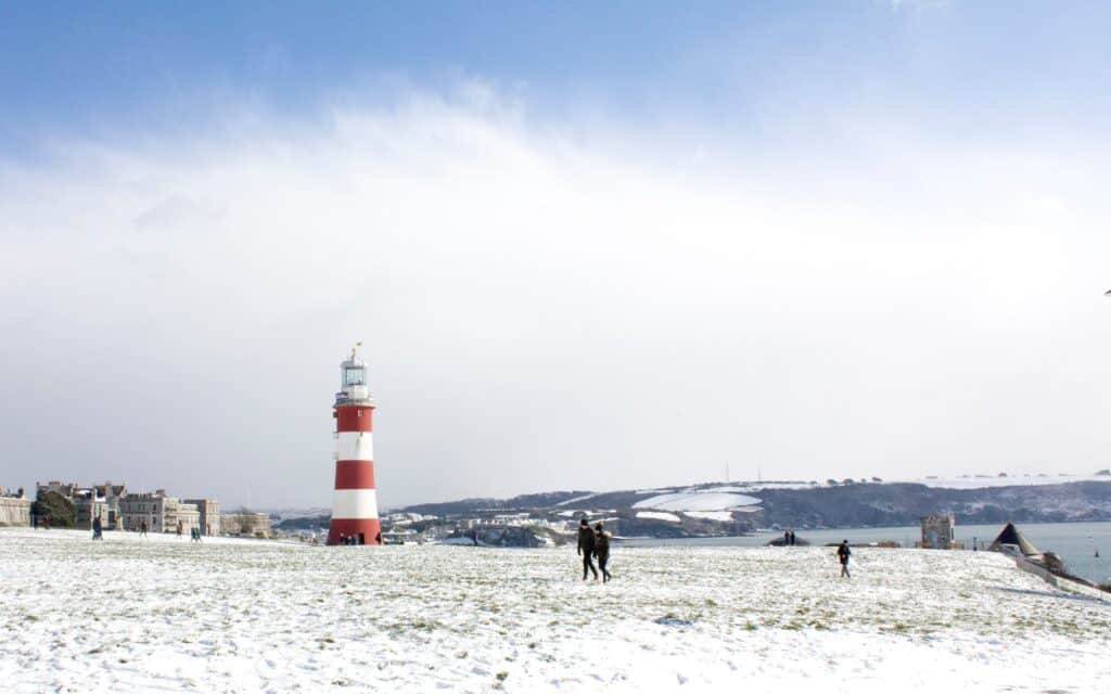 Smeatons Tower on Plymouth Hoe covered in snow