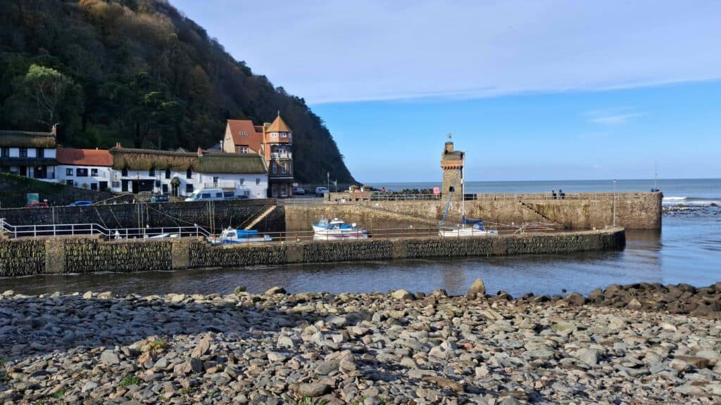 Rock and shingle beach in front of the North Devon village of Lynmouth