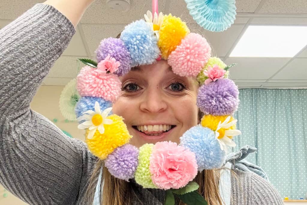 Emma at Pom Stitch Tassel modelling a pom pom hoop