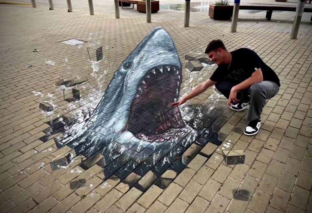 3D joe and max shark 3D artwork on pavement